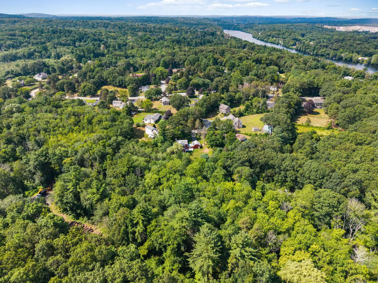 Wide drone view over Andover, MA from Mercury Cir