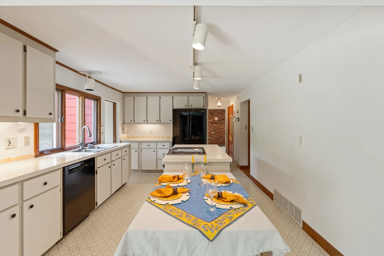 Kitchen with center island in a home on Mercury Cir in Andover, MA