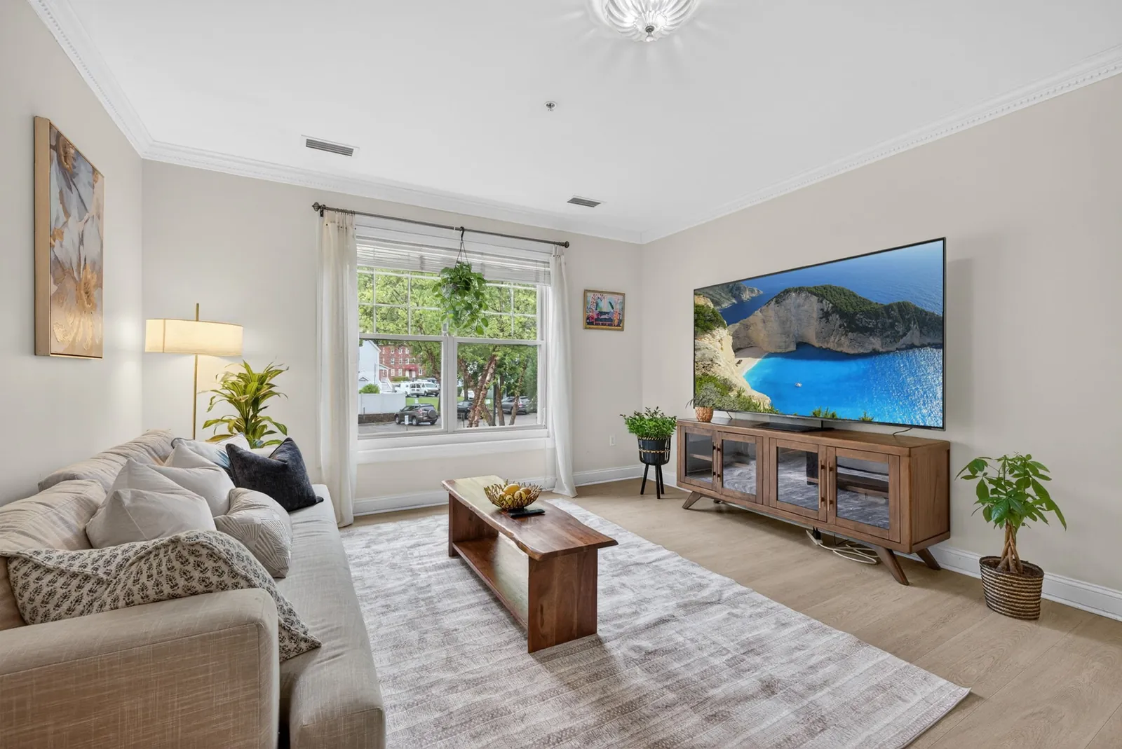 Condo living room with large windows in Wakefield, MA